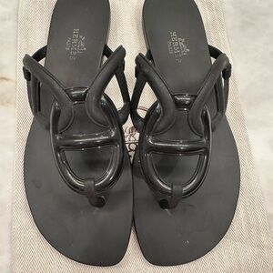 Hermes Black Sandals with Glossy Bow Design